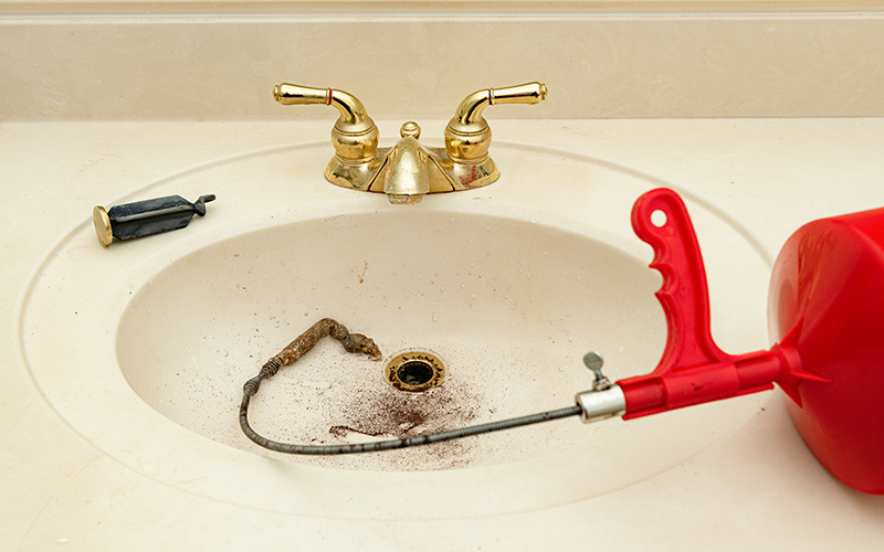 drain auger or snake for clogged bathroom